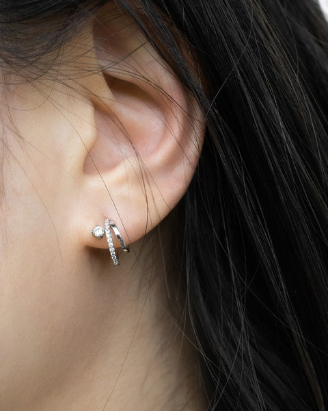 give your ears a whimsical look with the intrigue illusion earring in silver