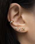 gold ear stack with Spade, Forbidden Fruit and Fleur ear studs