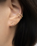 gold star garland ear studs and double layer cuff | the hexad earrings