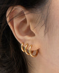 gold uki hoops worn layered in small, medium and large