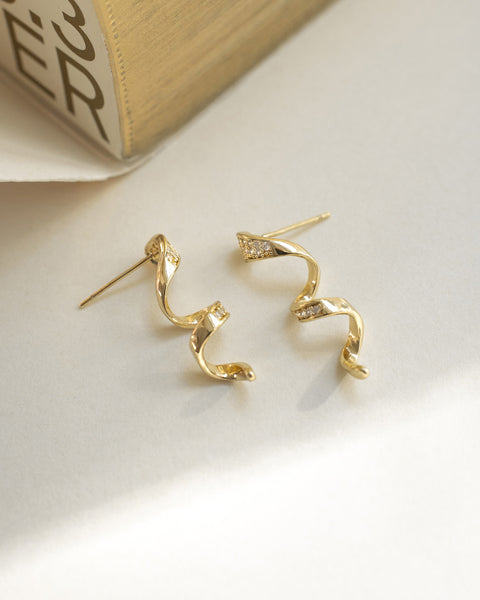 modern helical style statement earrings in gold