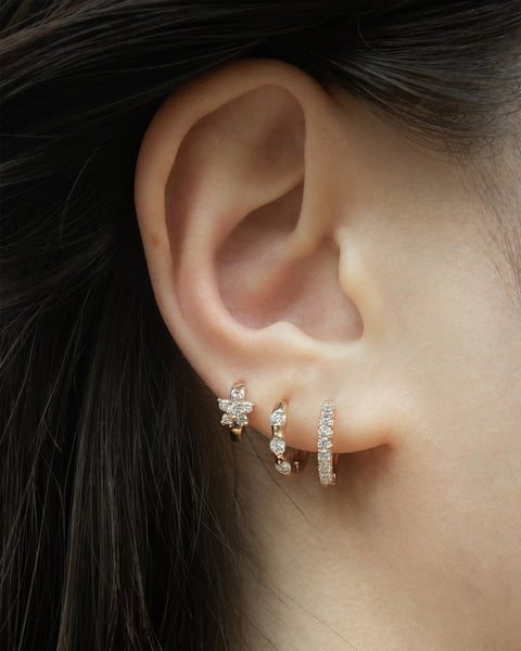 how to layer the hexad huggie hoop earrings for multiple piercings for a stylish shiny stack