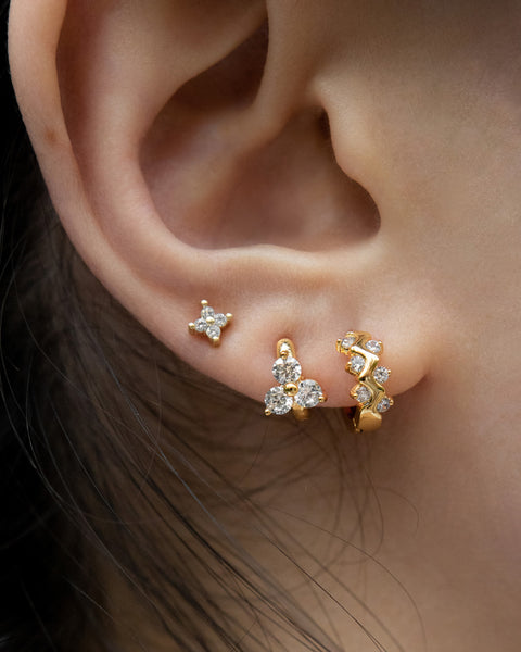 how to rock multiple earrings with some bling on your lobes