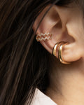 illusion earrings from the hexad creating the impression of having multiple ear piercings