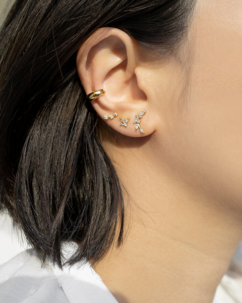 impactful ear party look with brand new stud earrings crafted with boldly cut zirconia stones for maximum shine