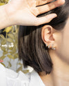 let your lobes shine with the hexad intricate diamond encrusted huggie hoops and stud earring