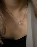 long style Lexi necklace with geometric inspired toggle pendant clasp