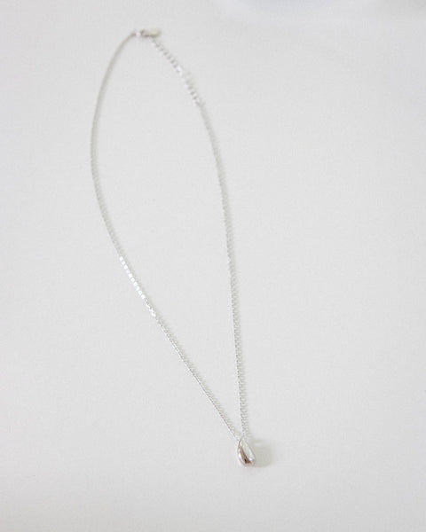 minimalist chain necklace with tiny raindrop pendant in silver