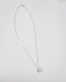 minimalist chain necklace with tiny raindrop pendant in silver