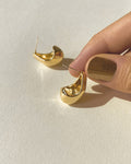 minimalist cocoon like Lucid earrings in gold by the hexad