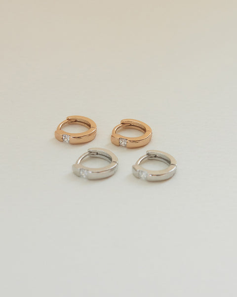 minimalist huggie earrings in gold and silver by the hexad fashion accessories label