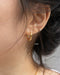minimalist gold huggie earrings in large size @thehexad