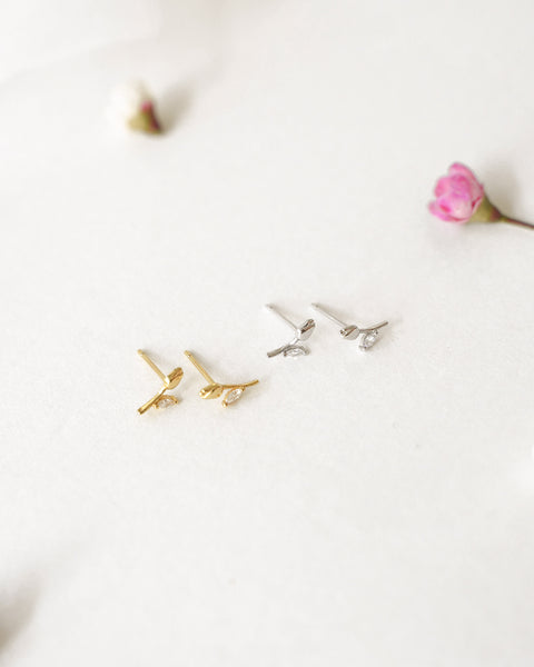 mini tulip flower stud earrings in gold and silver by the hexad