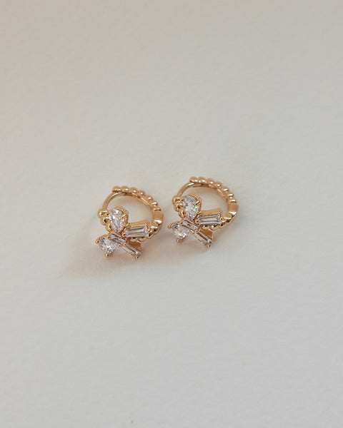 petite huggie earrings with girly feminine bow tie in rose gold @thehexad