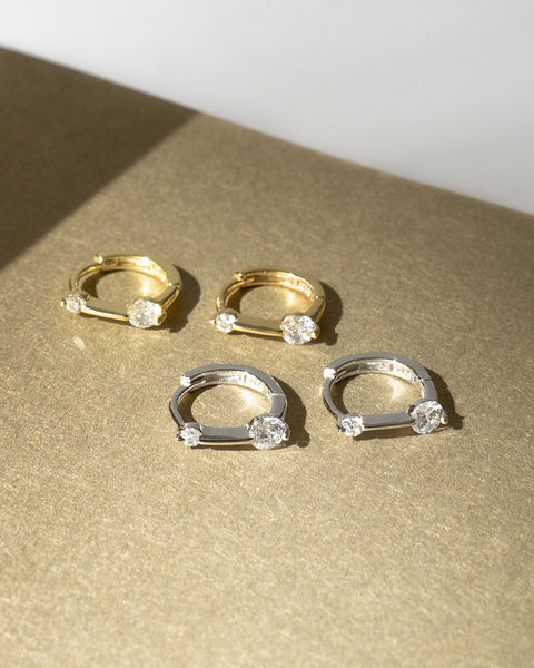 pixie huggie hoop earrings in gold and silver from the hexad newest ear jewellery collection for classic fashionistas