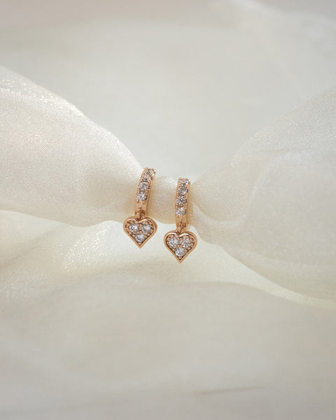 rose gold hoop earrings with adorable heart charm pave with diamonds @thehexad