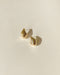 sculptural gold stud earrings for the modern woman