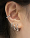 silver hoop earrings layered for a multi stack effect @thehexad