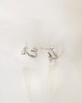 silver intrigue illusion earrings designed with cubic zirconia for a sparkly lobe