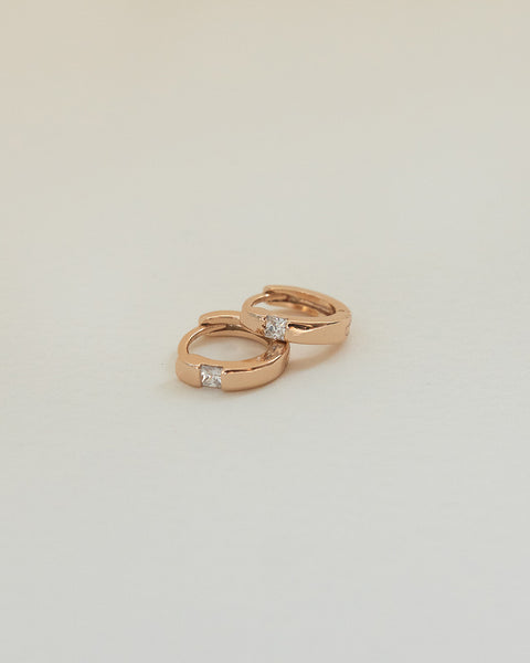 simple and effortlessly stylish hoop earrings with petite diamond by the hexad