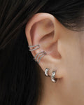 simple and stylish ear stack combination featuring rope ear cuffs and ise hoops in silver