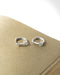 simple classy hoop earrings in silver with petite diamonds by sophisticated women jewelry label the hexad