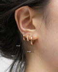 small and large size comparison of essential earrings by the hexad