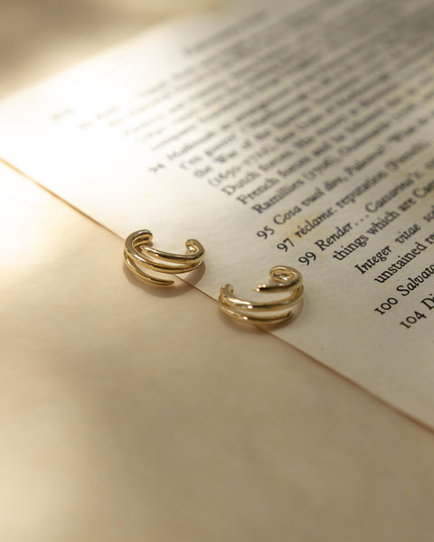 sleek minimalist triad ear cuffs designed by the hexad