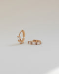sleek small huggie earrings with baguette cut diamonds @thehexad