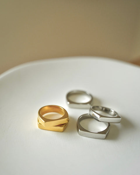 slim and bold signet rings in gold and silver for a polished everyday look