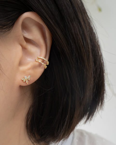 small honey bee stud earring layered with the favorite astraea double ear cuff