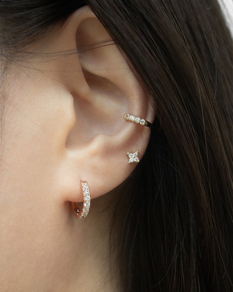 soiree diamond huggie hoop styled with bestselling moonshine ear cuff in a brilliant shiny stack