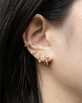 sparkle up your ear with diamante adorned jewellery including intrigue illusion earring, pixie huggie and cosmic ear cuff
