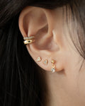 sparkly ear stack featuring dainty ear studs and sleek ear cuffs