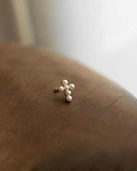 spiritual jewelry featuring roman catholic cross ear cuff with tiny pearls