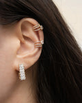 statement dazed earrings and double dynasty ear cuffs for an impactful stack