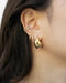 style your first to third ear piercings with contemporary hoops and stud earrings from the hexad