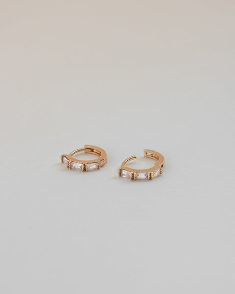 stylish hoop earrings with oblong cut diamonds designed for a snug fit by the hexad