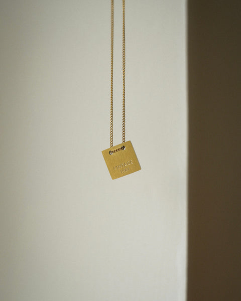 stylish pendant necklace plated in 18k gold from jewelry brand the hexad