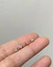 super tiny clover leaf stud earrings by the hexad