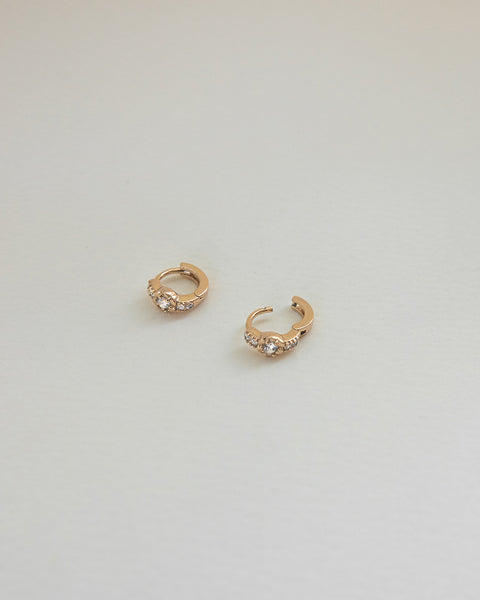 the hexad rosette huggie hoop earrings in long lasting 18K gold plating