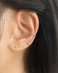 tiny subtle ear studs for casual off-duty look