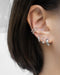 trendy runway style ear stack created by the hexad latest hoop earrings and no piercings required ear cuffs