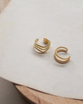twisted rope ear cuffs set in gold from the hexad