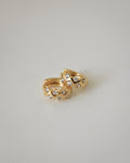 wavy design hoop earrings with diamonds by the hexad