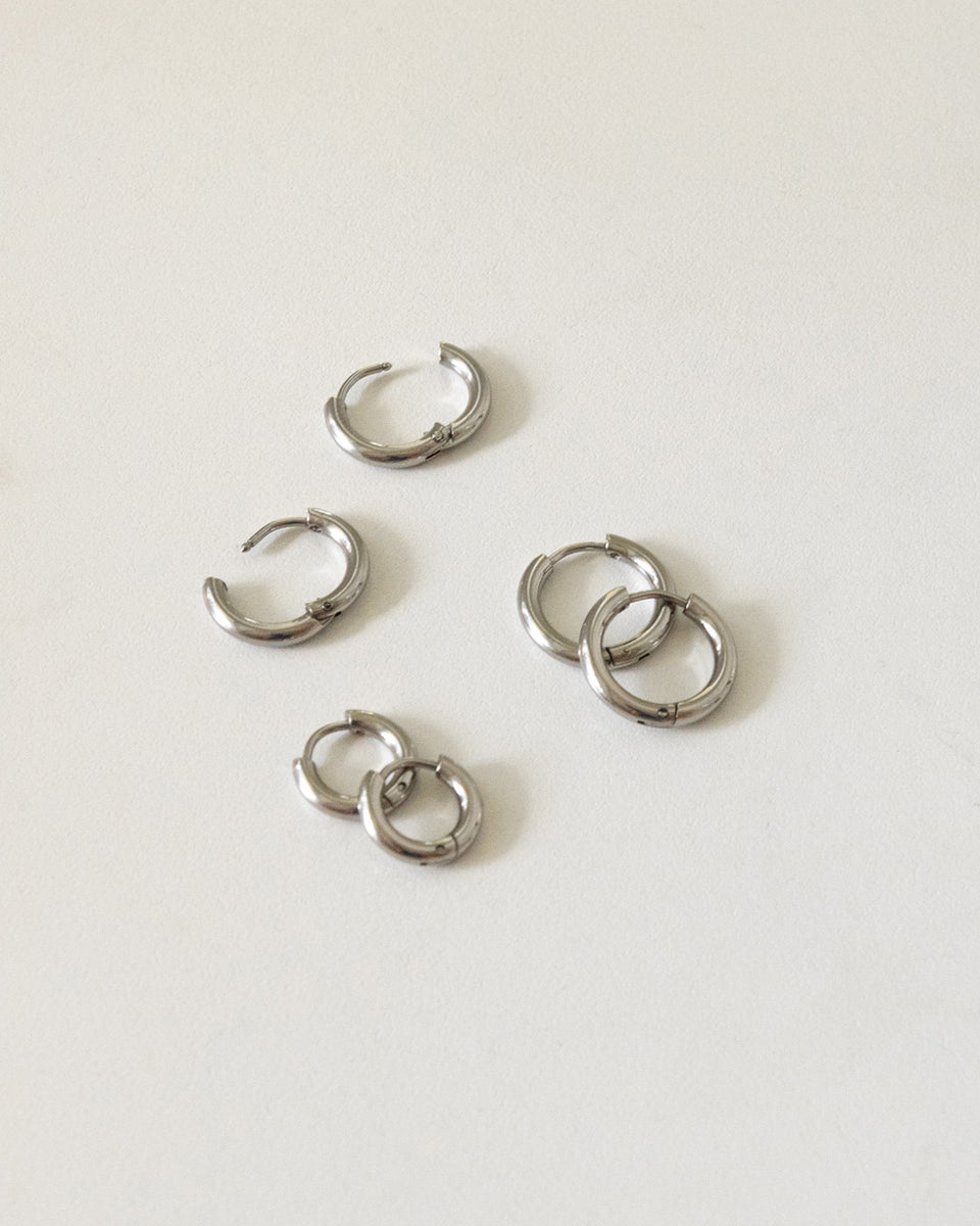 UKI Huggie Hoops in Silver The Hexad