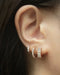 wear your shiny huggie hoops in a modern layered stack
